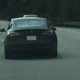 Illustration for article titled This Tesla Model 3 Prototype Spied On The Road Looks Spectacularly Good
